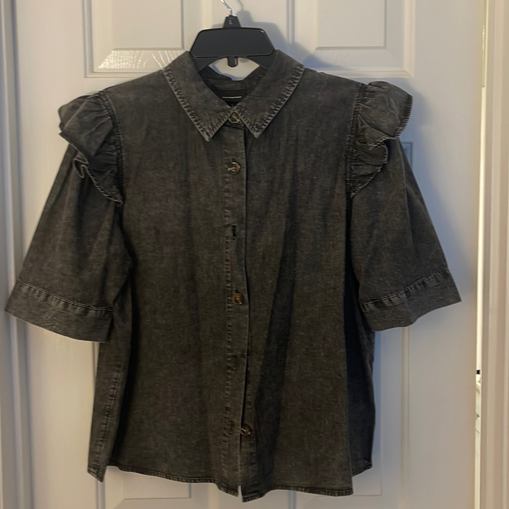 Black distressed denim with ruffle sleeve shirt. Who What Wear.